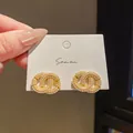 Elegant vintage oval stud earrings featuring delicate pearl inlay on a gold-toned base - Oval Double Ring Pearl (43) / Gold
