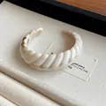 Elegant ivory resin twisted cuff bracelet with marble texture presented in luxury jewelry tray - Open Style (28#) / White