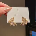 Elegant gold-tone butterfly stud earrings with marquise-cut crystals in a set - Inlaid Rhinestone Butterfly (46) / Gold