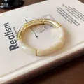 Elegant cream marble resin and gold-plated segmented stretch fashion bracelet for women - Bamboo Joint Style (35#) / Gold