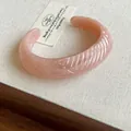 Elegant pink resin open bangle bracelet with textured leaf pattern detail for women. - 50# Bracelet - Pink