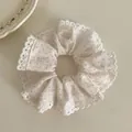 Elegant white mesh hair scrunchie with blue polka dots and delicate lace trim decor - Scrunchie / White Lace Polka Dot