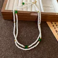 Elegante französische doppelreihige Perlenkette mit grünen Perlen und Goldakzenten für Damen - Zweilagiger Perlen- und grüner Achat-Stil(43#)