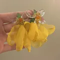 Elegant handmade yellow chiffon flower earrings with clear petals and hypoallergenic silver needle. - Style 33