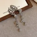 Ethnic style vintage silver tassel hair clip with rhinestone flower and bell detail - Vintage Oval Floral Bell Tassel Style / Silver