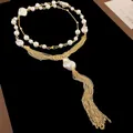 Detailed view of vintage artificial pearl tassel necklace with elegant gold chain - Pearl 6-16mm / Gold