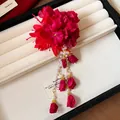 Close-up of red fabric flower hair clip with elegant pearl tassels and floral accents - Red Flower Tassel Style (Single Piece) / Red