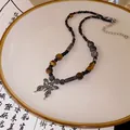 Collier de perles de style ethnique rétro avec pendentif papillon argenté et brun foncé - Style Pendentif Papillon (37#)