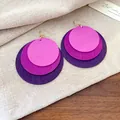 Detailed view of bohemian layered purple wooden disc drop earrings on textured linen background. - Hook Style / Purple Gradient