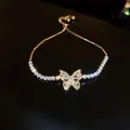 Bracelet papillon élégant en zircon doré avec fermoir coulissant réglable pour femme - Style Papillon (36#)
