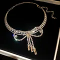 Close-up of elegant bowknot choker necklace with pearls and crystal tassels in a box. - Chain Only / 48# Silver Bow Pearl Tassel