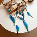 Detail view of Bohemian feather headband with wood beads and vibrant blue tassels - Feather Hairband (HH8917) / Coffee Blue