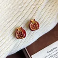 Elegant gold plated pomegranate stud earrings with red zircons and red enamel - Red Pomegranate Earrings