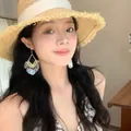 Bohemian gold filigree dangle earrings with white shell pendants for beach vacation - Hook Style / White