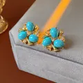 Vintage gold-tone stud earrings featuring blue turquoise stones and sparkling rhinestones - Earrings Only (With 925 Silver Post) / Gold-Blue