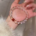 Elegant clear crystal bead bracelet featuring a single vibrant red agate accent bead - Style 26 Clear Crystal (With Gift Box) / Clear