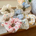 Assorted Korean style fabric scrunchies with cute floral and fruit prints in a wooden tray - 7-Piece Set / Cream