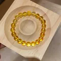 Bracciale in perle di agata gialla di alta qualità su supporto in legno naturale - Diametro 10mm / Giallo