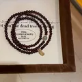 Elegant three-strand dark red beaded bracelet featuring gold Fu charm and green jade - Style 96 Hetian Jade & Garnet (With Gift Box) / Dark Red