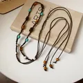 Macro detail of Bohemian braided hemp rope waist chain with wood and turquoise beads - 3# Waist Chain