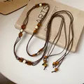Bohemian multi-layer hemp rope waist chain with natural wooden beads in vintage ethnic style - 2# Waist Chain / Brown