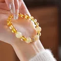 Elegant yellow citrine beaded bracelet with decorative gold spacers worn on a manicured hand - Style 4 Citrine & Tiger's Eye (With Gift Box) / Yellow