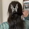 Elegant silver butterfly metal hair claw clip for a stylish half-up hairstyle look - Silver Hollow Butterfly (5#)
