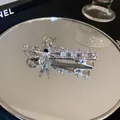 Elegant silver butterfly hair clip with shimmering rhinestones and black center stone - Silver Rhinestone Butterfly (14#)