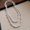 Elegant French retro long pearl necklace with varying bead sizes as a stylish sweater chain - Mixed Pearl Sizes Style / 4-8mm / White