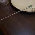 Elegant traditional Chinese hair stick featuring a green jade-like bud and silver finish - Hollow Bud (39#) / Silver/Green