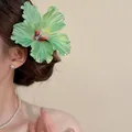 Elegant green fabric hibiscus flower hair clip perfect for a sweet seaside holiday style - Hairpin #62 - Green (single)