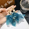 Bohemian blue feather tassel earrings with pearl and crystal floral studs for women - Petal Pearl Feather Style (HE15583)