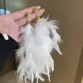 Bohemian white feather tassel earrings with elegant gold studs for a vintage look. - Gold Silver Earring Post / White