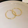 Elegant gold twisted hoop earrings with large round circle design for women - Twisted Spiral Large Hoop (89#) / Large / Gold