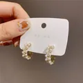 Elegant gold-tone C-shape hoop earrings embellished with pearls and sparkling crystals - Silver Needle Tassel Style (31)