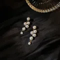 Elegant linear drop earrings featuring multiple white pearls on a gold-tone finish - Pearl Tassel Drop Earrings (12#)