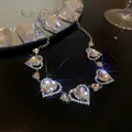 Close-up of luxury heart-shaped rhinestone necklace on reflective black background - 14# Heart Rhinestone Necklace