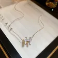 Elegant silver-tone box chain necklace featuring a sparkling pavé crystal H-shaped pendant - 41# Pave Rhinestone H Necklace