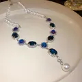 Detailed view of a French vintage necklace featuring blue stones and white pearls - Necklace / Blue
