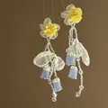 Macro detail of dopamine flower earrings with blue seed beads and yellow organza petals - Glass Bead Flower (HE19018) / Yellow (10#)