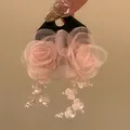 Detailed view of pink fabric rose earrings with dangling petals and pearls - Mesh Rose Flower Style (21#) / Pink