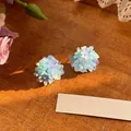 Macro view of colorful beaded flower earrings with iridescent finish on wood background. - Silver Earring Post Handmade Beaded Flower Cluster (43#) / Blue