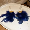 Elegant deep blue feather tassel drop earrings with gold semi-circle top and silver needles. - Feather Tassel Ear Hook / Blue