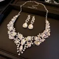 Elegant bridal jewelry set featuring a teardrop rhinestone necklace and matching drop earrings - White K Silver