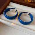 Retro Klein blue bold hoop earrings with silver needle displayed in jewelry box - Wide Face-39mm Hoop / Blue