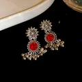 Detailed shot of vintage court style flower earrings with red rhinestones and beads - Earrings / 925 Silver Needle / Silver With Red Rhinestone