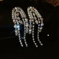 Elegant silver needle earrings with long cascading rhinestone tassels in vintage style. - Silver Pave Rhinestone Multi-Chain Tassel