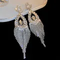 Elegant silver-toned rhinestone fringe tassel drop earrings with marquise crystals - Hollow Geometric Rhinestone Tassel