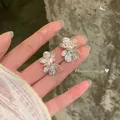 Elegant silver flower stud earrings with hammered petal design for women's jewelry collection - Hammered Metal Petal Style / Silver (7#)