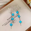Dopamine-style floral tassel earrings featuring vibrant blue clover pendants and silver chains - Gradient Flower Clover Tassel Style (33#) / White-Blue (33#)